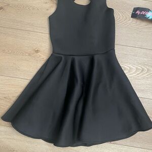 Never worn, with tags adorable black dress